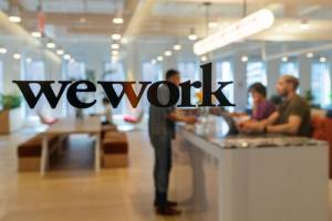 Αναβολή των σχεδίων για IPO από την WeWork